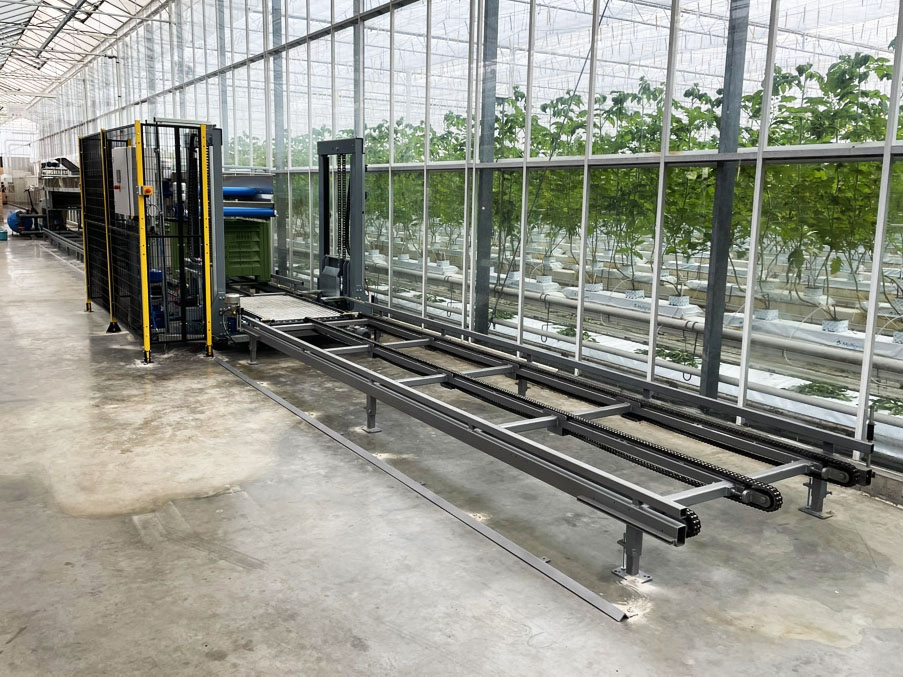 Volledig geautomatiseerd kistenvulsysteem gerealiseerd voor een klant in Nederland